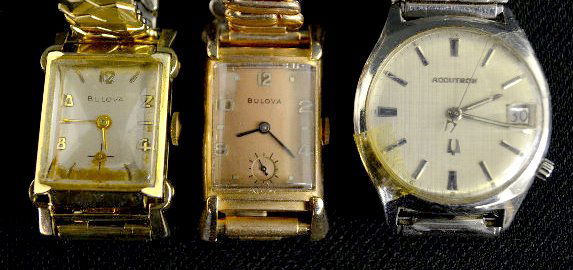 3 Bulova Wrist Watches - 2 Gold Filled: 3 Bulova Wrist Watches - 2 Gold Filled: 1.) 21 J; No. 7834737; circa 1954; with a silver dial with gold features; on a Speidel flex band. The watch is running at this time. (There is some rust colored