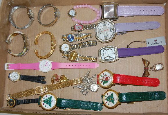 18 Women's Wrist and Pin Watches: 18 Women's Wrist and Pin Watches: 1.) 2 Pin Watches - Bulova +. 2.) Swank Button Watch. 3.) 15 Women's wrist watches in assorted styles and ages. None tested. All sell as is, where is.