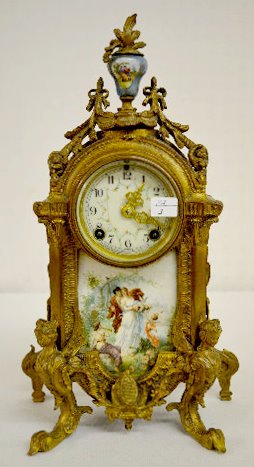 New Haven "Lenore" Painted Porcelain Mantel Clock: New Haven "Lenore" Painted Porcelain Mantel Clock: With an unmarked T&S movement; a decorated porcelain dial and a "New Haven" paper label inside the door. In a metal case with lady head corners; a de