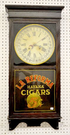 Sessions "Regulator No. 2" Adv. Calendar Clock: Sessions "Regulator No. 2" Adv. Calendar Clock: With a T&S movement; a paper calendar dial marked "Sessions"; and lower door advertising "La Reforma Havana Cigars 5?". The pendulum and key are with th