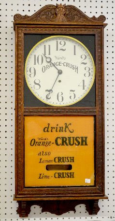 Gilbert "Observatory" Adv. Orange Crush Clock: Gilbert "Observatory" Oak Adv. Orange Crush Clock: With a TO movement; an unmarked paper dial advertising "Ward's Orange-Crush"; a lower glass advertising "drink Ward's Orange-Crush also Lemon-Crush L