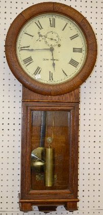 Seth Thomas Oak Regulator No. 2 Clock: Seth Thomas Oak Regulator No. 2 Clock: With a TO movement; a painted metal dial marked "Seth Thomas"; the weight, pendulum and key. Not tested. (The paint on the dial is chipped.) 36" Long Sells as is