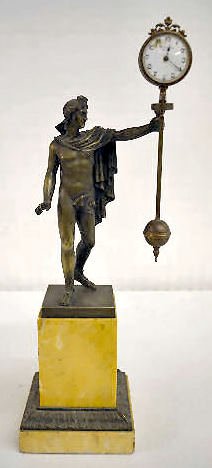 French Bronze & Marble Swinging Clock, Man Statue: French Bronze & Marble Swinging Clock, Man Statue: With an 8 day watch key wind movement and a porcelain dial marked "Oscillator 8 Day". There is a bronze statue of a Romanesque style man, wearing a c