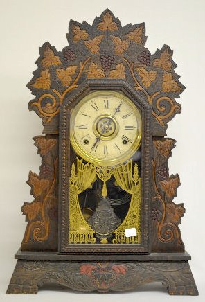 Gilbert "Bouquet 50" Oak Kitchen Clock: Gilbert "Bouquet 50" Oak Kitchen Clock: With a T&S with alarm movement; a paper dial marked "Wm. L. Gilbert" ; a paper label on the back; and the pendulum. The top of the clock matches the Gilbert "Co