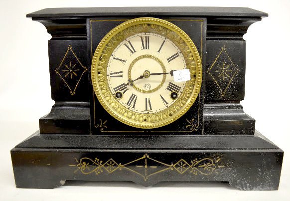 Ansonia "Palermo" Iron Case Mantel Clock: Ansonia "Palermo" Iron Case Mantel Clock: With a signed T&S movement; a paper dial marked "A" and the pendulum. (The clock is running but not striking at this time. ) (The case has a rough finish. The