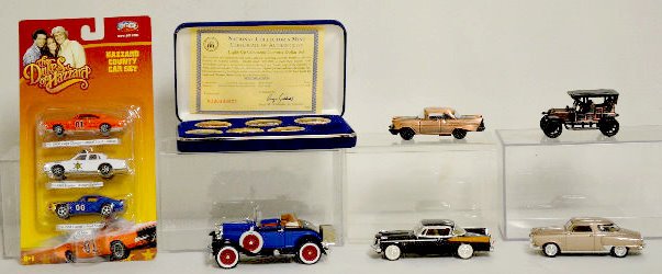 Die Cast Cars & Corvette Coins: Die Cast Cars & Corvette Coins: 1.) Two Studebaker cars - 1950 Champion and 1958 Golden Hawk. 2.) 1929 Ford Model A. 3.) Vintage Touring car. 4.) 1957 2 Door Classic. 5.) Dukes of Hazzard Set: 1969 Do