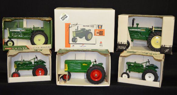 6 Oliver Toy Tractors: 6 Oliver Toy Tractors: 1.) Spec. Cast Oliver 440 in OB; 5 1/4" x 8 1/4". 2.) Spec. Cast Oliver Super 44 in OB; 5 1/2" x 8 1/4". 3.) Spec. Cast Oliver Row Crop 66 in OB; 6" x 10". 4.) Ertl Oliver 1555