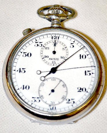 Aristo 15J Chronograph Pocket Watch: Aristo 15J Chronograph Pocket Watch: The size 14 to 16 main dial has a seconds dial and a 30 minute timer dial on it. The dial is in a white base metal case. All of the functions are working correctly