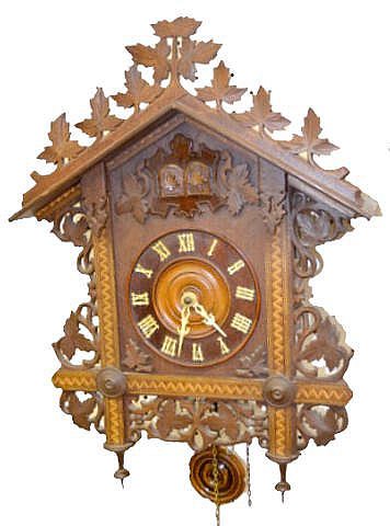 Antique German 3 Weight Cuckoo & Quail Clock: Antique German 3 Weight Cuckoo & Quail Clock: In a nice inlaid case with leaf carved decoration. (The pendulum is worn.) 23 1/2" Tall; 17 1/2" Wide Not tested. Sells as is, where is.