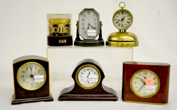6 Vintage Small Dresser Clocks: 6 Vintage Small Dresser Clocks: Includes New Haven tambour; Lux metal; Japan tape measure; Seth Thomas; Brass bell strike alarm and Seth Thomas wood. Not tested. All sell as is, where is.