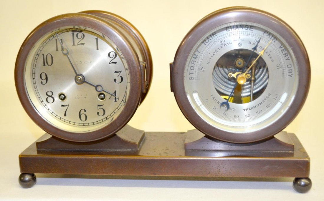 Chelsea Bronze Ships Clock: Chelsea Bronze Ships Clock: Barometer and thermometer; plays ships bell; name on dial is faint. Sells as is, where is.