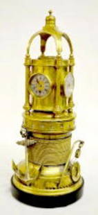 Brass 5 Dial Revolving Clock: Brass 5 Dial Revolving Natical Theme Clock: 2-Time; thermometer; compass; barometer. Sells as is, where is.