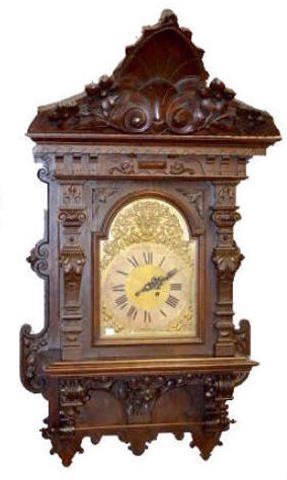 Massive Carved Gustav Becker Wall Clock: Massive Carved Gustav Becker Wall Clock, Hanging Model: metal dial. 48" T x 27" W. Not tested. Sells as is, where is. Please note, this item sells F.O.B., which means you the buyer must make your own