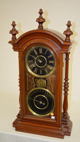 Mahogany New Haven Fashion #9 Clock: Mahogany New Haven Fashion #9 Clock: T&S; black dial marked "Manufactored for National Clock Co."; short pendulum. 32"T Not tested. Sells as is, where is.