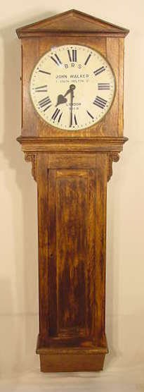 Early Oak English Jewelers Regulator Clock NR: Early Oak English Jewelers regulator clock; painted 18" dial; B.R. (s) John Walker 1. South Molton Street London 985.B. (Restored case; lower door lock missing) approximately 80" T x 23" W x 10 1/2" D