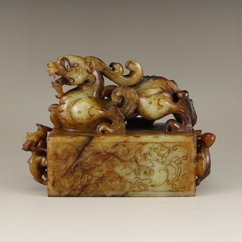 Chinese Han Dynasty Hetian Jade Pixiu Seal: 中國漢代 和田玉老玉招財貔貅玉璽 Chinese Han Dynasty Hetian Jade Pixiu Seal Dimension: 140x95x65(mm)5.51x3.74x2