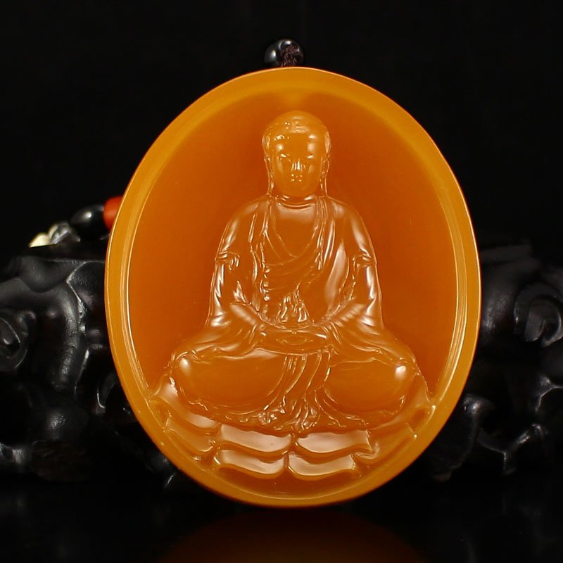 Indonesia Jin Tian Huang Siddhartha Buddha Pendant: Indonesia Jin Tian Huang Siddhartha Buddha Pendant w Certificate Dimension: 75x65x17(mm)2.95x2.56x0.67(inches) Weight 0.38 lbs/174 g The wooden stand no included