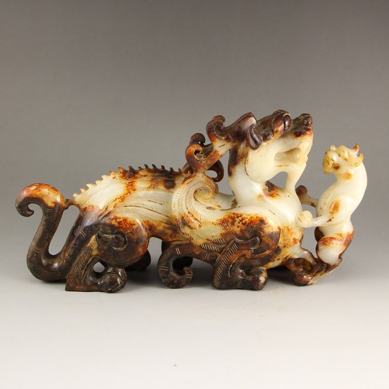 Chinese Han Dynasty Hetian Jade Chi Dragon Statue: Chinese Han Dynasty Hetian Jade Chi Dragon Statue Dimension: 210x105x50(mm)8.27x4.13x1.97(inches) Weight 1.83 lbs/832 g
