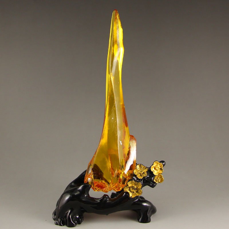 Chinese Natural Yellow Zircon Original Stone Statue: Chinese Natural Yellow Zircon Original Stone Statue Dimension: 170x50x25(mm)6.69x1.97x0.98(inches) Weight 0.73 lbs/332 g The wooden stand no included.
