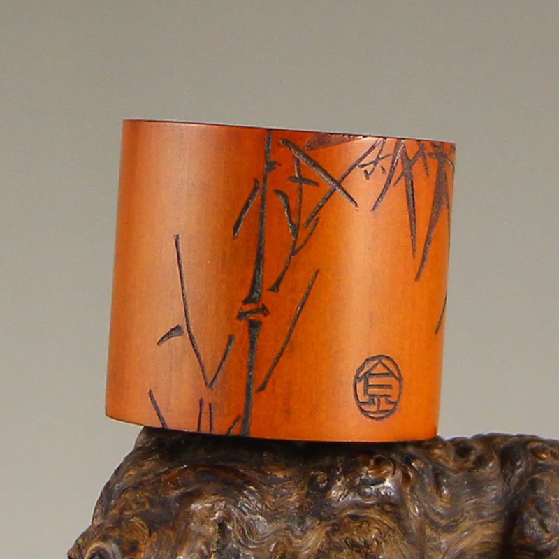 Vintage Chinese Zitan Wood Inlay Bamboo Thumb Ring: Vintage Chinese Zitan Wood Inlay Bamboo Thumb Ring Dimension: 30x23x6(mm)1.18x0.91x0.24(inches) Weight 0.04 lbs/18 g The wooden stand no included.