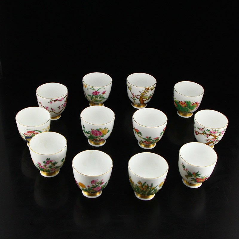 Set 12 Gilt Edges Famille Rose Porcelain Wine Cups: Set of 12 Qing Dynasty famille rose porcelain wine cups with Yongzheng mark. The set is matching in motif but distinct in individual imagery of each piece. They all include gilt gold edges. Dimension: