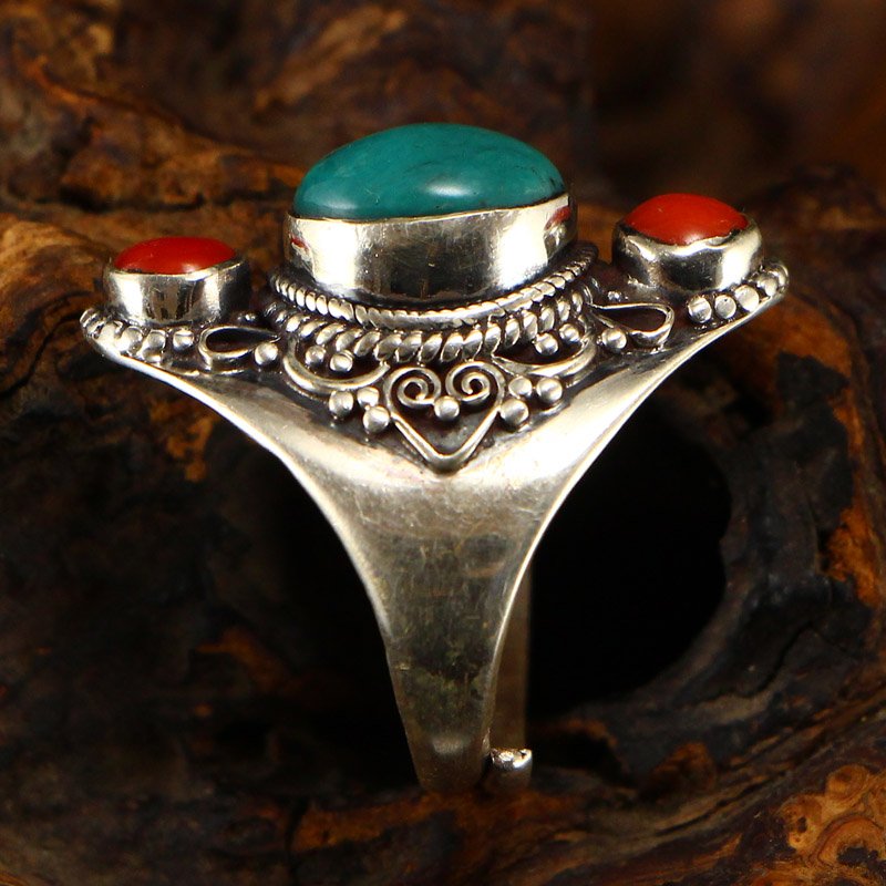 Chinese 925 Silver Inlay Turquoise & Coral Men's Ring: Chinese 925 Silver Inlay Turquoise & Coral Men's Ring Adjustable Size US Size: 9 Dimension: 29 x 20 x 8 (mm) 1.14 x 0.79 x 0.31 (inches) Weight: 0.02 lbs/10 g The wooden stand is not included.