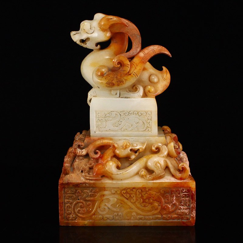 Vintage Hetian jade Lucky Beast Double Seals: Gorgeous Hetian jade Lucky beast seals. A smaller, Lucky beast-topped seal rests atop a complex base that is also its own seal. Both seals are carved from beautiful red and white jade, which further a
