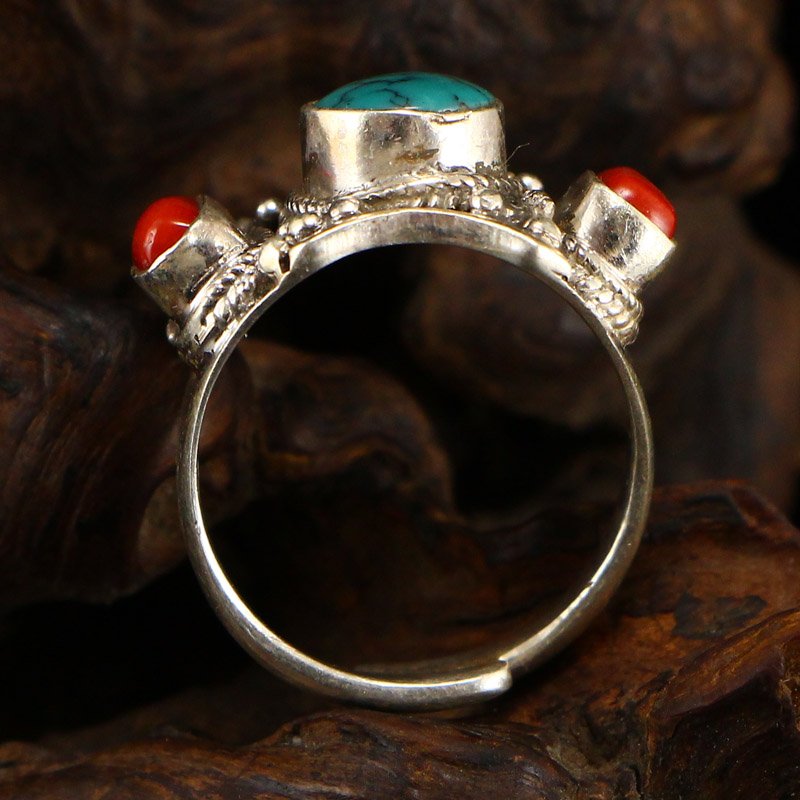 Chinese 925 Silver Inlay Turquoise & Coral Men's Ring: Chinese 925 Silver Inlay Turquoise & Coral Men's Ring Adjustable Size US Size: 9 Dimension: 17 x 23 x 7 (mm) 0.67 x 0.90 x 0.27 (inches) Weight: 0.02 lbs/10 g The wooden stand is not included.