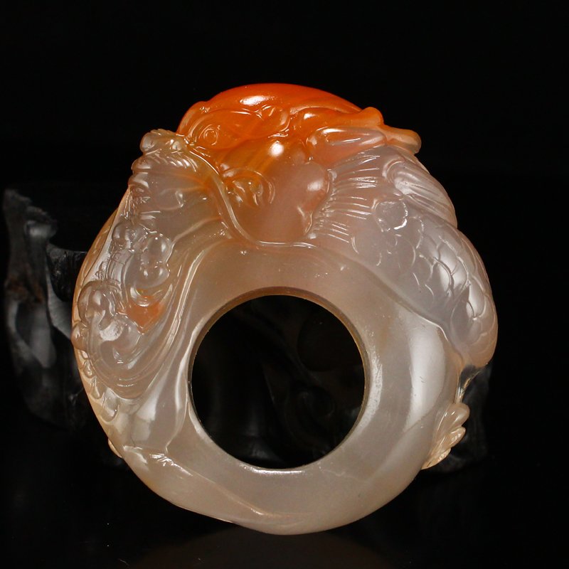 Chinese Natural Nanhong Agate Dragon Head Ring: Chinese Natural Nanhong Agate Dragon Head Ring w Certificate US Size: 11 Dimension: 56 x 51 x 18(mm) 2.20 x 2.01 x 0.71(inches) Weight: 0.14 lbs/63.56 g The wooden stand no included.