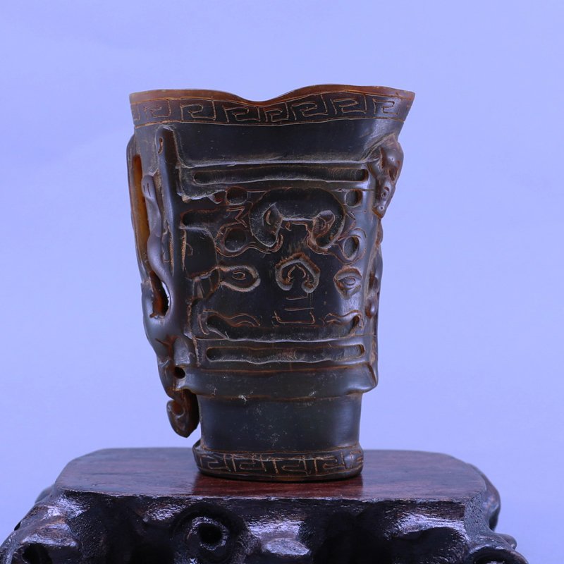 Vintage Chinese Ox Horn Low Relief Chi Dragon Wine Cup: Vintage Chinese Ox Horn Low Relief Chi Dragon Wine Cup Dimension: 94x71x33(mm) 3.70x2.80x1.30(inches) Weight: 0.33 lbs/150 g The wooden stand no included.
