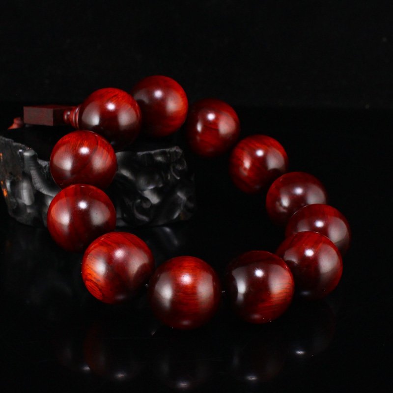 Chinese Zitan Wood Beads Bracelet: Chinese Zitan Wood Beads Bracelet Dimension: 22(mm)0.87(inches) Weight: 0.19 lbs/87 g The wooden stand no included.