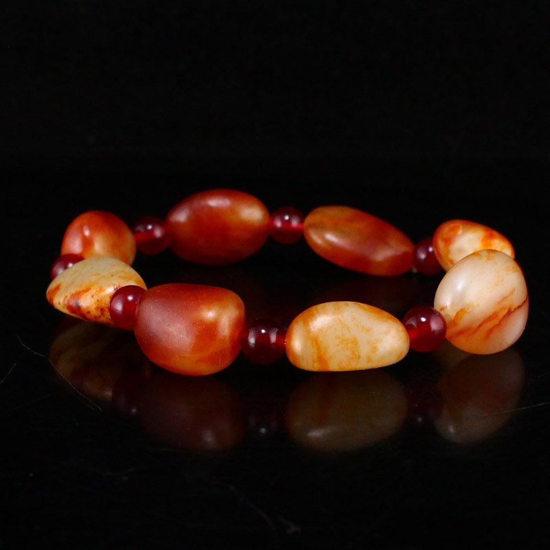 Chinese Hetian Jade Bead Bracelet: Chinese Hetian Jade Bead Bracelet w Certificate Dimension: 24 x 18 x 9(mm)0.94 x 0.71 x 0.35(inches) Weight 0.14 lbs/62 g The wooden stand no included