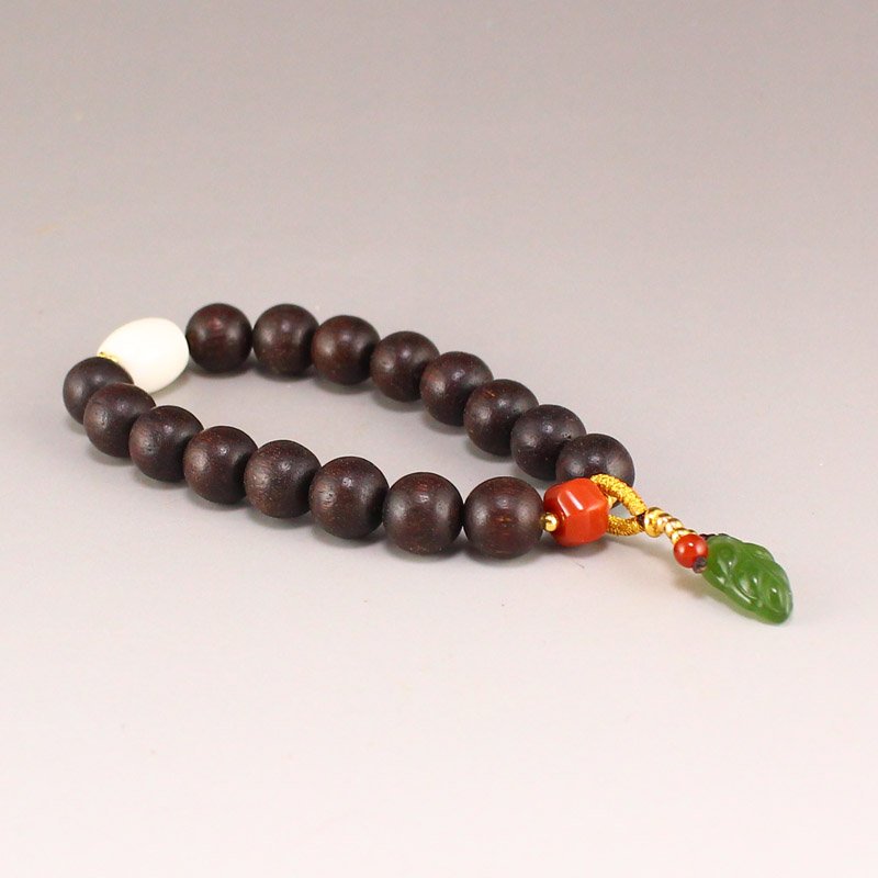 Chenxiang Wood & Green Hetian Jade Beads Bracelet: Chinese Chenxiang Wood & Green Hetian Jade Beads Bracelet Dimension: 10(mm) 0.39(inches) Weight: 0.03 lbs/14 g The wooden stand no included.