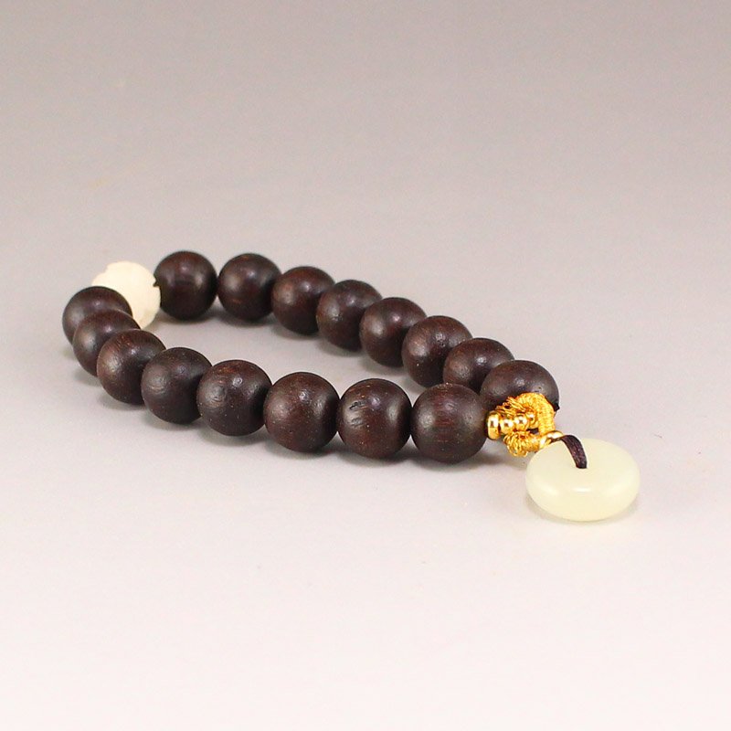 Chenxiang Wood & Hetian Jade Beads Bracelet: Chinese Chenxiang Wood & Hetian Jade Beads Bracelet Dimension: 10(mm) 0.39(inches) Weight: 0.03 lbs/12 g The wooden stand no included.