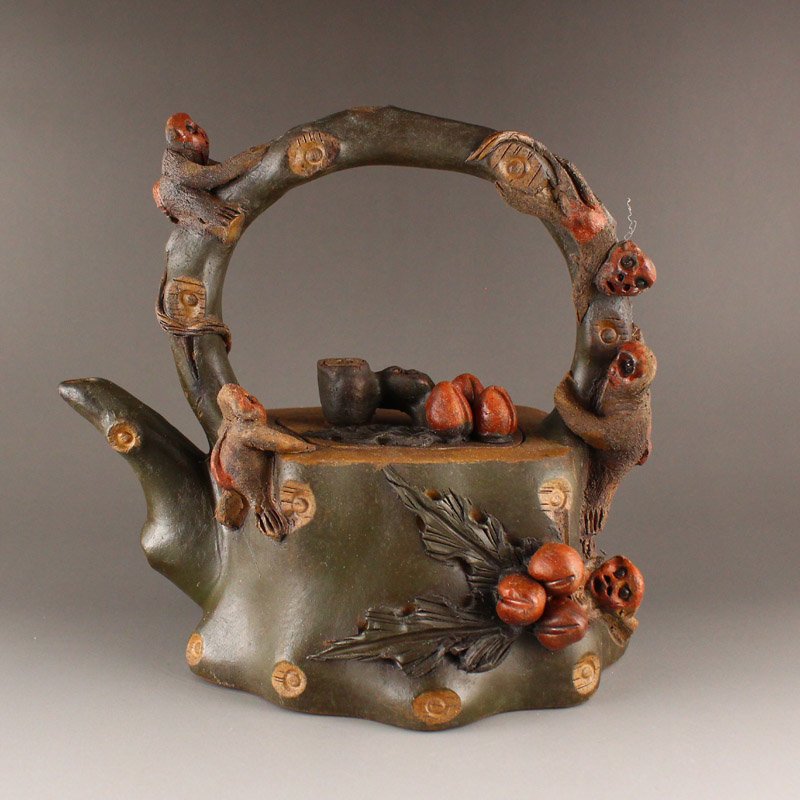 High Relief Monkey & Peach Yixing Zisha Clay Handle Teapot: Chinese High Relief Monkey & Peach Yixing Zisha Clay Handle Teapot w Artist Signed Dimension: 160 x 170 x 110(mm) 6.30 x 6.69 x 4.33(inches) Weight 1.59 lbs/720 g