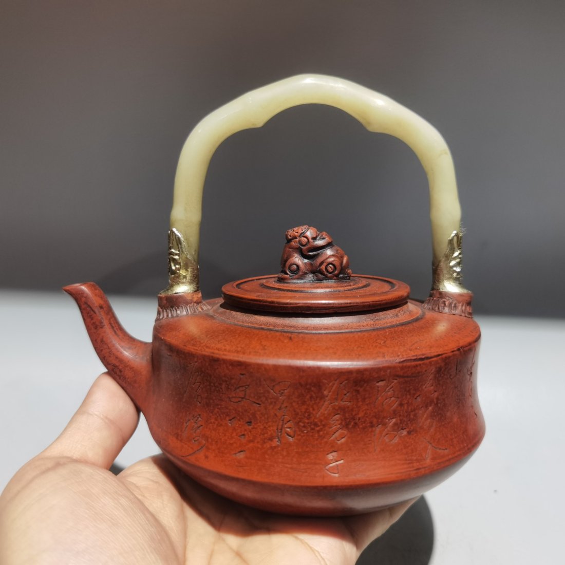 Chinese Yixing Zisha Clay & Jade Handle Teapot: Chinese Yixing Zisha Clay & Jade Handle TeapotDimension: 150x150(mm) 5.91x5.91(inches)