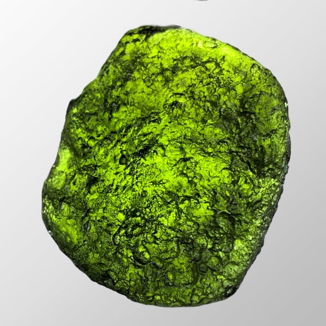 Czech Republic Moldavite Green Meteorolite Original Stone: Czech Republic Moldavite Green Meteorolite Original StoneDimension: 45 x 40 x 13 (mm) 1.77 x 1.57 x 0.51(inches) Weight : 0.08 lbs/ 38.9 g