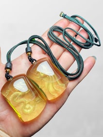 A Pair Beautiful Yellow Crystal Inner Carving Dragon Phoenix Pendant
