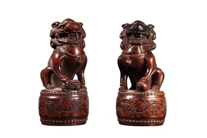 A Pair Antique Chinese Chenxiang Wood Carved Fortune Lion Statues