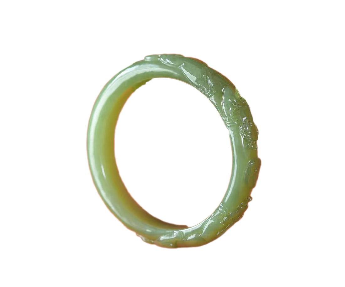 Inside Diameter 58 MM Chinese Hetian Jade Carved Chi Dragon Bracelet: Inside Diameter 58 MM Chinese Hetian Jade Carved Chi Dragon BraceletInside Diameter: 58 (mm) 2.28 (inches)Dimension: 11.9 x 8.1 (mm) 0.47 x 0.32 (inches) Weight:0.11 lbs/ 50.54 g