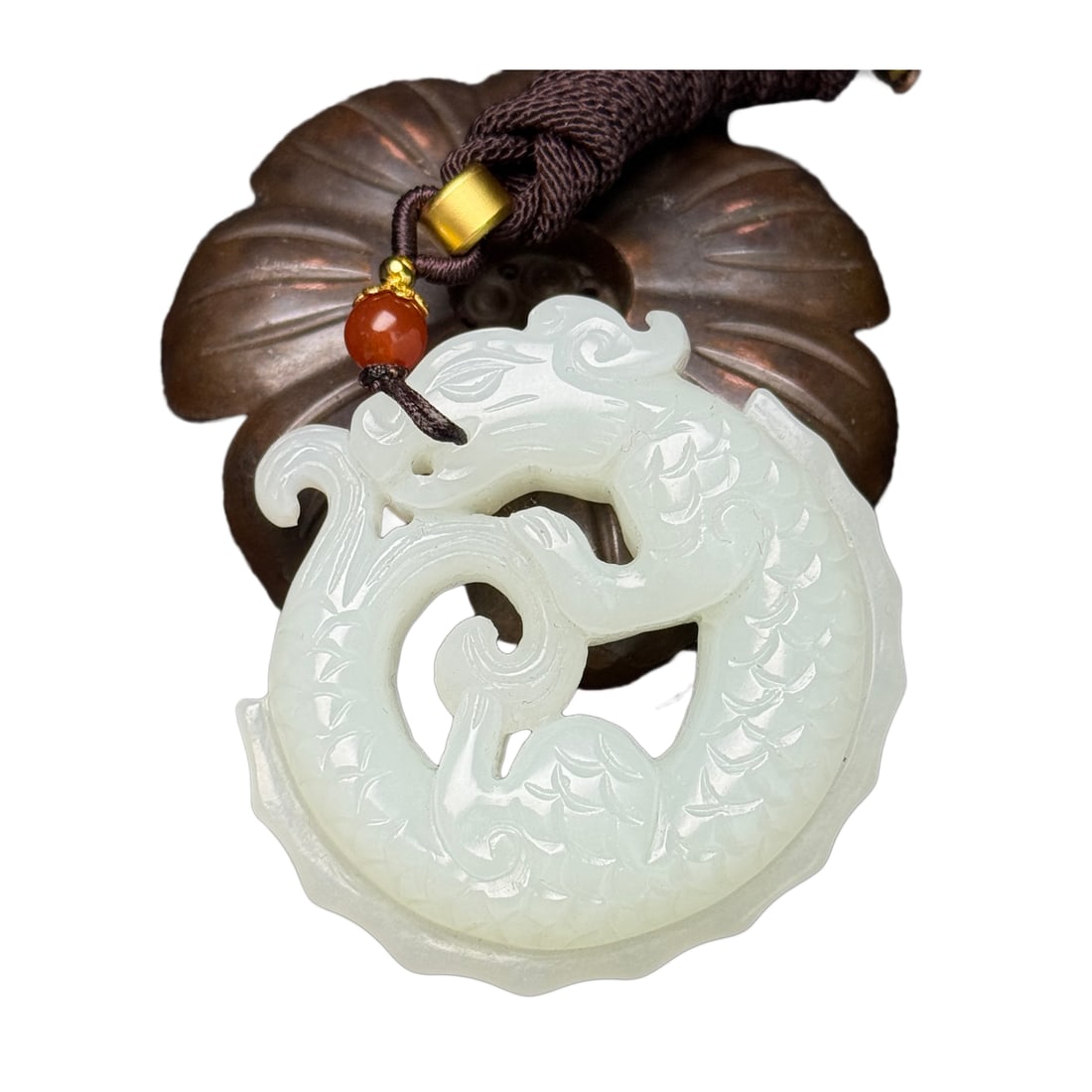 Chinese Hetian Jade Carved Dragon Pendant: Chinese Hetian Jade Carved Dragon PendantDimension: 52 x 51 x 14 (mm)2.05 x 2.01 x 0.55 (inches) Weight:0.11 lbs/ 51 g