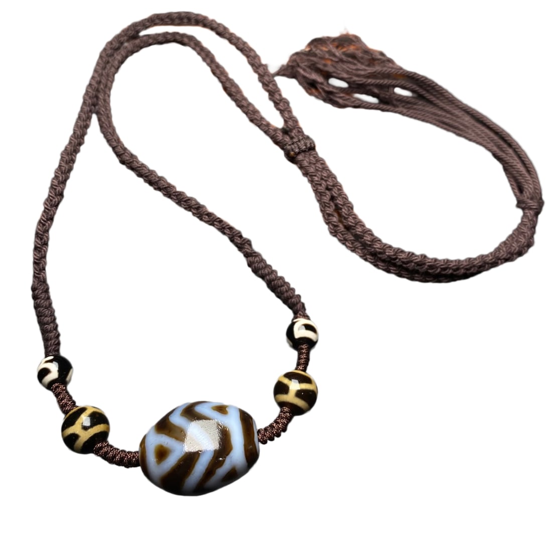 Old Tibetan DZI Agate Lucky Pendant: Old Tibetan DZI Agate Lucky PendantDimension: 25 x 20 x 16.5 (mm) 0.98 x 0.79 x 0.65 (inches) Weight: 0.04 lbs/ 19.5 g