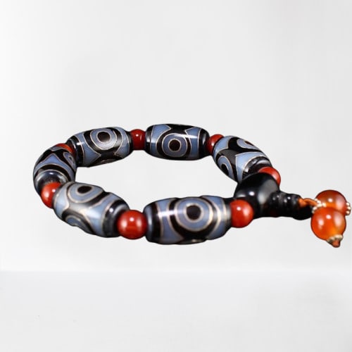 Tibetan DZI Agate Inlay Silver Wire Prayer Bracelet: Tibetan DZI Agate Inlay Silver Wire Prayer Bracelet Dimension: 24 x 14 x 14(mm) 0.94 x 0.55 x 0.55(inches) Weight 0.13 lbs/60 g The wooden stand not included.