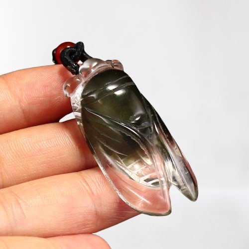 Beautiful Green Crystal Carved Fortune Cicada Pendant: Beautiful Green Crystal Carved Fortune Cicada Pendant Dimension: 42 x 20 x 13 (mm)1.65 x 0.79 x 0.51 (inches) Weight: 0.03 lbs/ 13.6 g