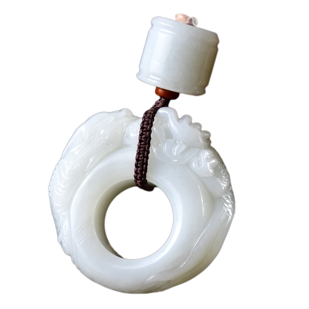 Chinese Hetian Jade Hand-Carved Divine Beast Pendant(Handheld Ornament) w Dragon & Certificate: Chinese Hetian Jade Hand-Carved Divine Beast Pendant(Handheld Ornament) w Dragon & Certificate 87.87gDimension: 52 x 18 (mm) 2.05 x 0.71 (inches) Weight: 0.19 lbs/ 87.87 g