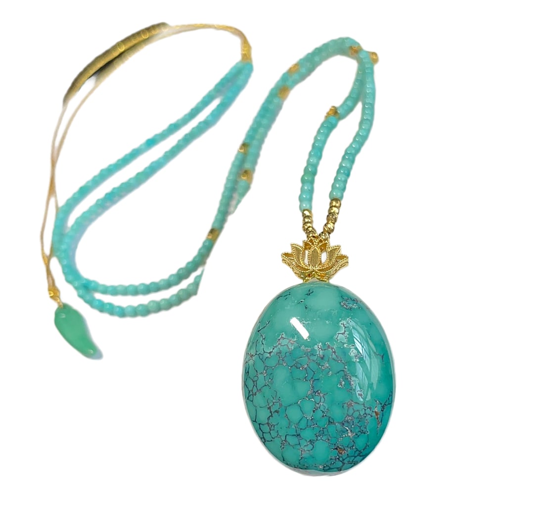 18K Gold Inlay Turquoise Hand-Carved Licky Pendant w Hand Woven Beads Necklace: 18K Gold Inlay Turquoise Hand-Carved Licky Pendant w Hand Woven Beads NecklaceDimension: 2.2 (mm) 0.09 (inches) Dimension: 26.4 x 21 x 10.5 (mm) 1.04 x 0.83 x 0.41 (inches)