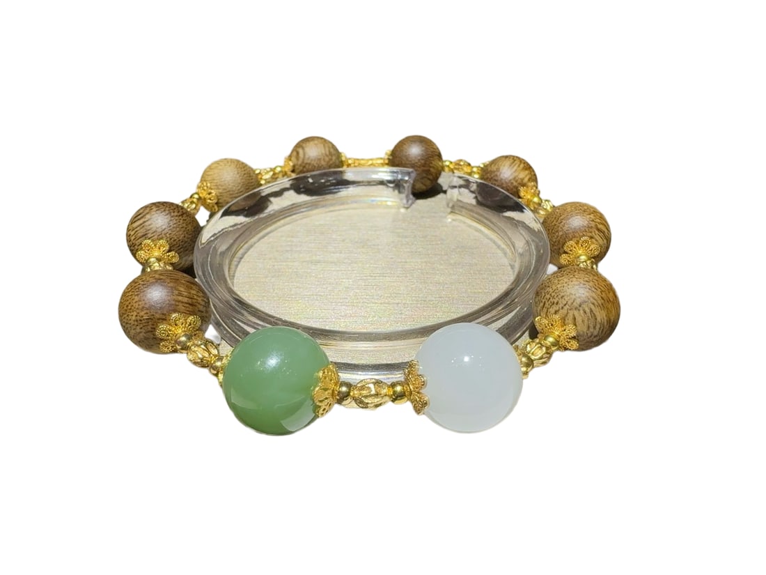 Hand Woven Chenxiang Wood & Hetian Jade Beads Bracelet: Hand Woven Chenxiang Wood & Hetian Jade Beads BraceletDimension: 12 (mm) 0.47 (inches)