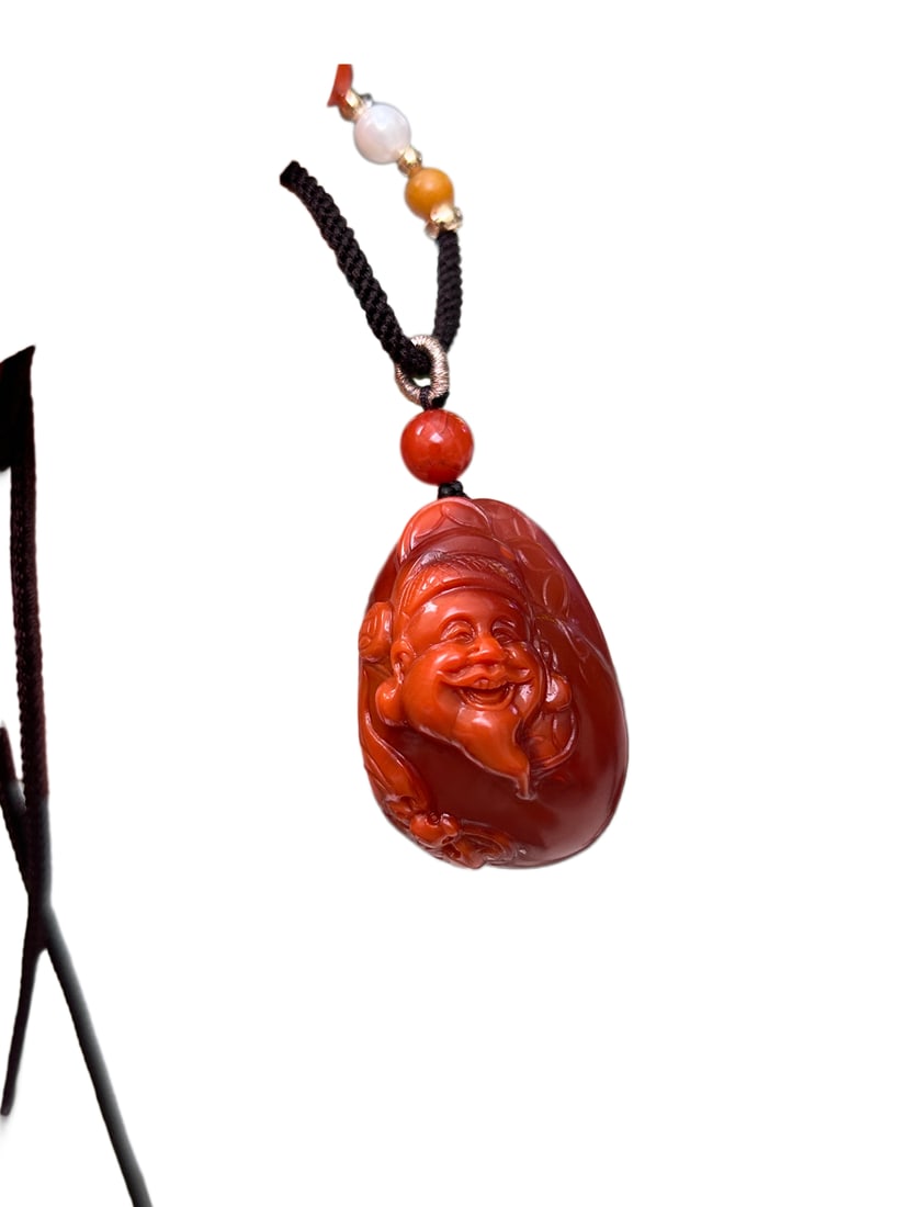 Natural Nanhong Agate Hand-Carved Figure Pendant w Fortune Taoism Deity: Natural Nanhong Agate Hand-Carved Figure Pendant w Fortune Taoism DeityDimension: 32.5 x 22.6 x 18.3 (mm) 1.28 x 0.89 x 0.72 (inches) Weight: 0.05 lbs/ 22 g