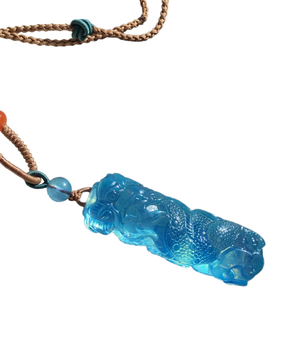 Aquamarine Hand-Carved Pendant w Dragon: Aquamarine Hand-Carved Pendant w DragonDimension: 47 x 16 x 15.5 (mm) 1.85 x 0.63 x 0.61 (inches) Weight: 0.04 lbs/ 18.6 g