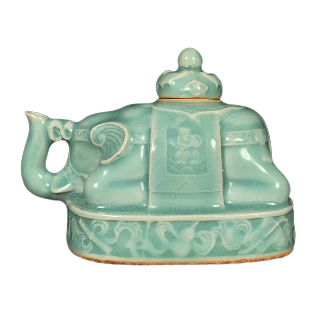 Porcelain Teapot w Elephant,Song Dynasty: Porcelain Teapot w Elephant,Song Dynasty Dimension: 115 x 85 (mm) 4.53 x 3.35 (inches)